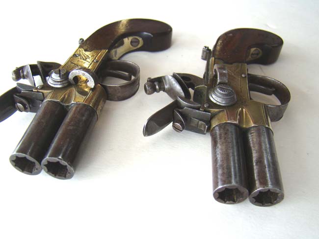 A fine pair of Henry Nock double barrel brass frame flintlock pocket pistols circa 1775-1785 — image 4